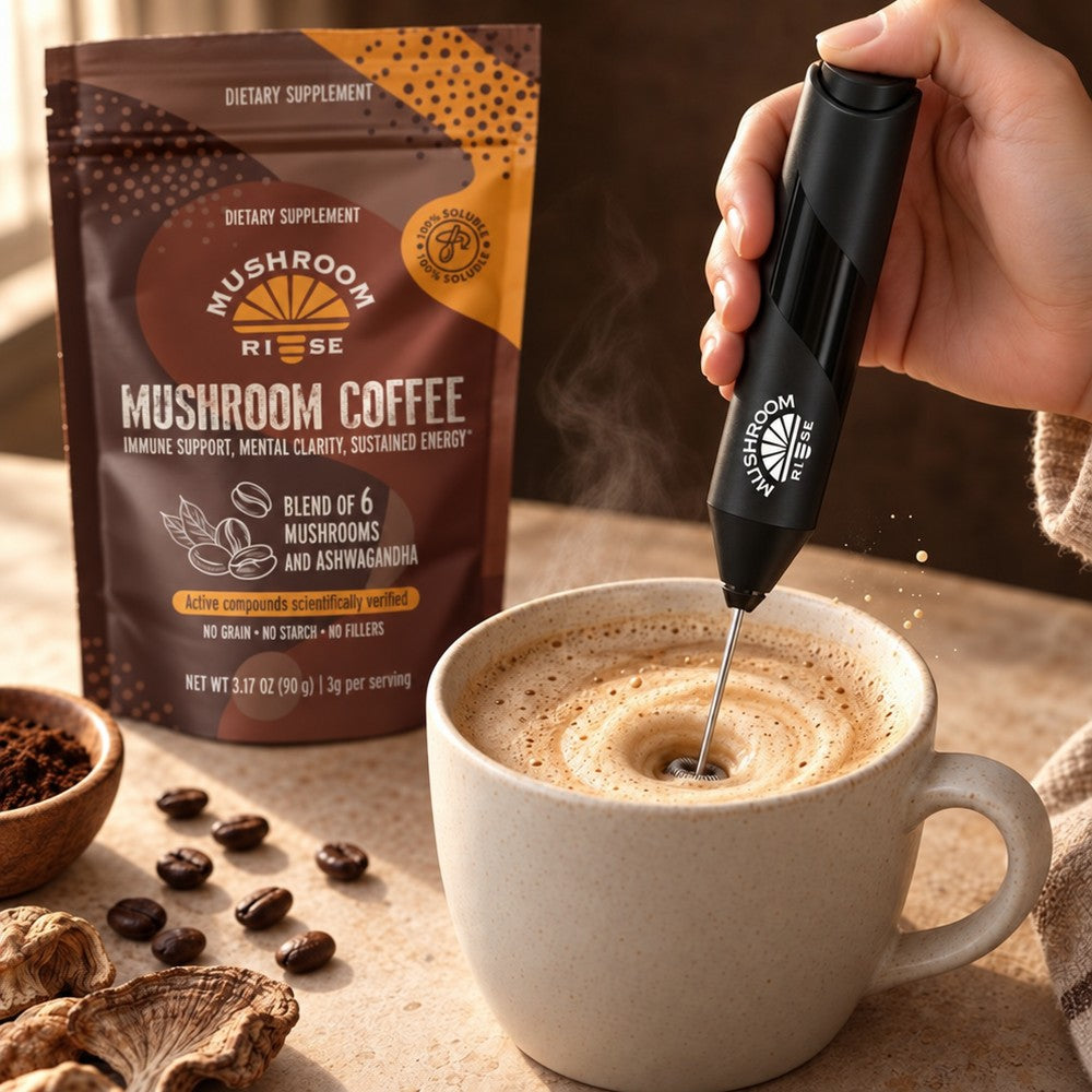 The free handheld frother whisking a cup of Mushroom Coffee